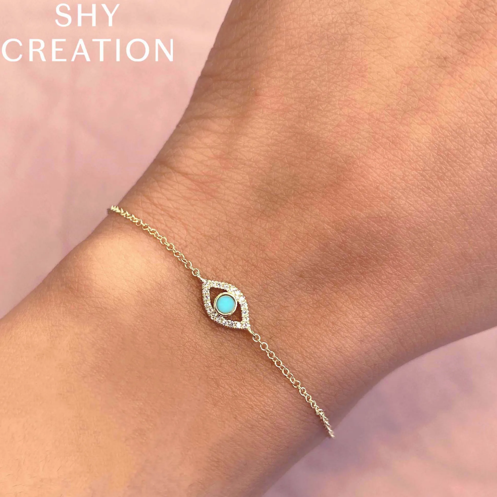 0.06CT DIAMOND & 0.07CT COMPOSITE TURQUOISE EYE BRACELET