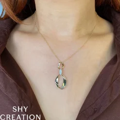 0.10CT DIAMOND MOBIUS NECKLACE