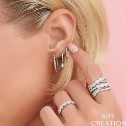0.26CT DIAMOND OVAL HUGGIE EARRING