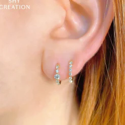 0.26CT DIAMOND OVAL HUGGIE EARRING